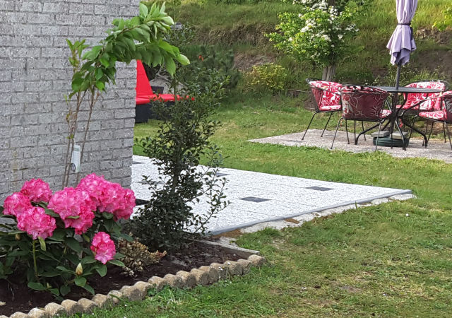 Afbeelding tuin rondom bungalow